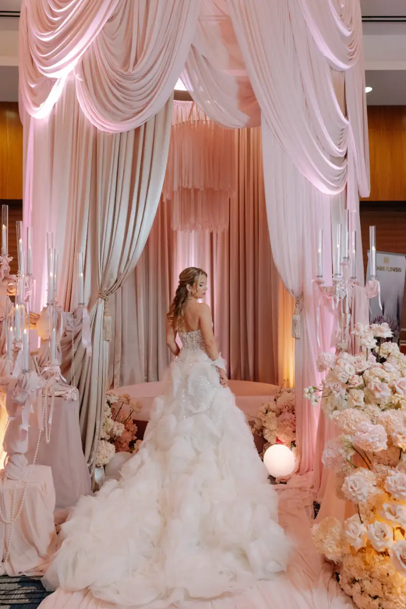 Bride photographed in a draped Vancouver ceremony space