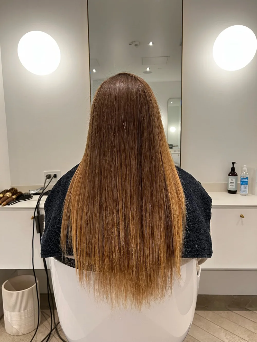 Sleek, straight blowout finished at Wish Dry Bar